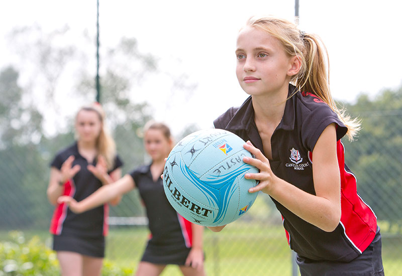 Girl playing netball