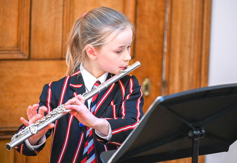 Girl playing flute