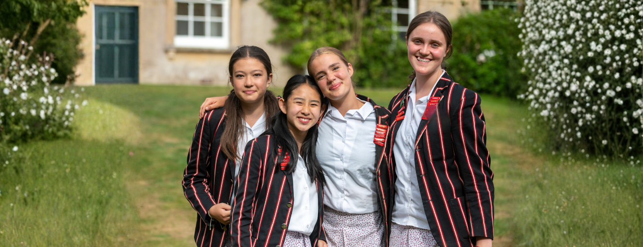 portrait photo of four female students