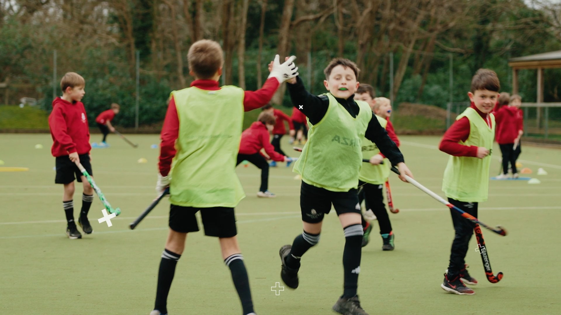 students playing football